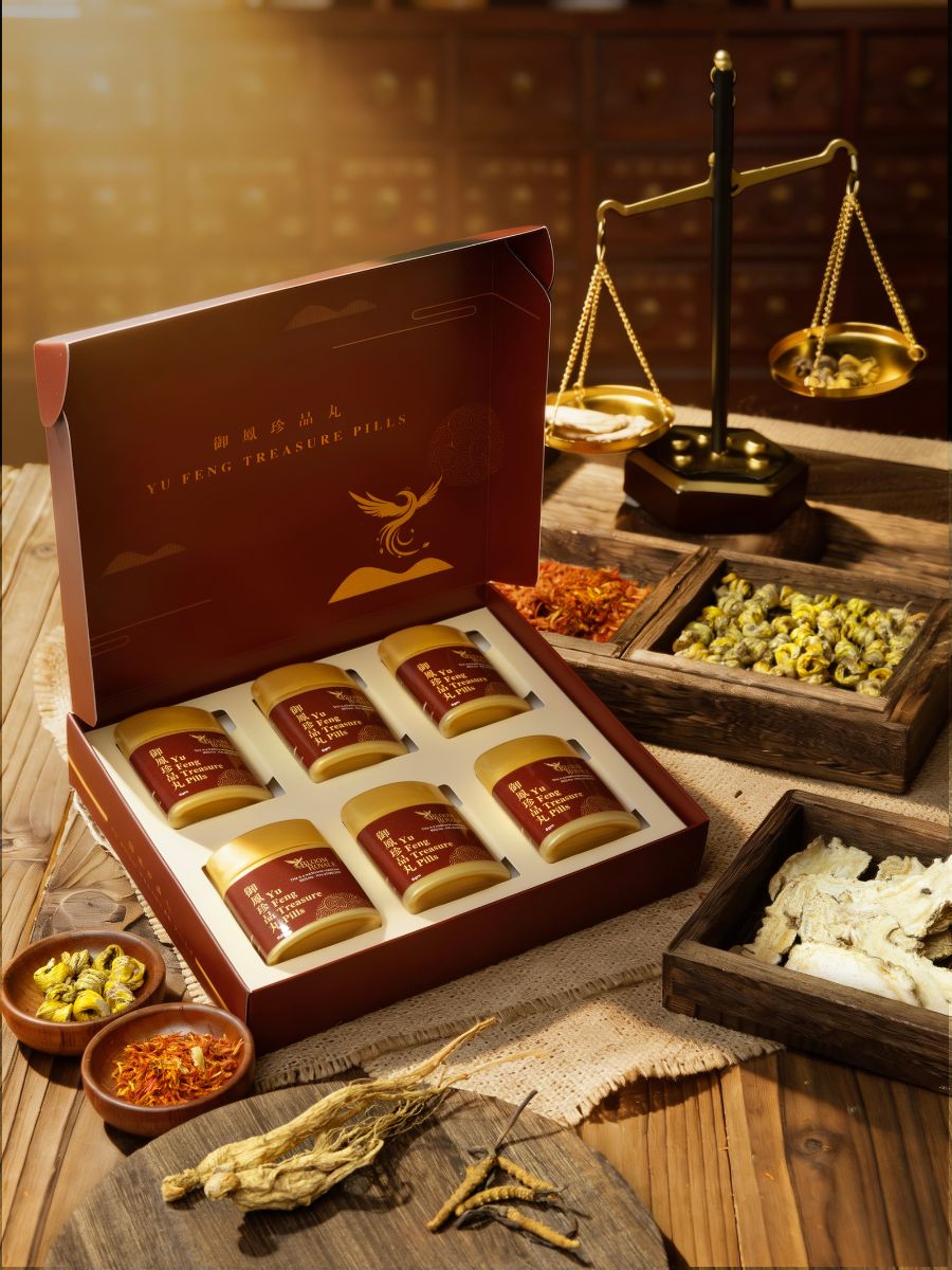 Bloom Royale gift box with bottles, herbs and a brass scale